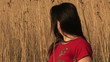Video: Woman looking around in a wheatfield Woman looking around in a wheatfield