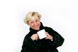 older woman drinking coffee