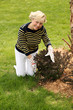 older woman gardening