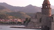 View of a city and historic monument by the sea