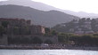 View of a harbour and castle with visitors