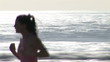 Sporty woman  running on the beach
