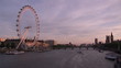 View of London eye and Thames at sunset