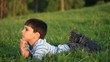 Boy Lying in the Grass