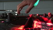 Dj scratching a record during a party