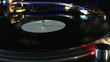Close up of a disk recording on a turntable during a party