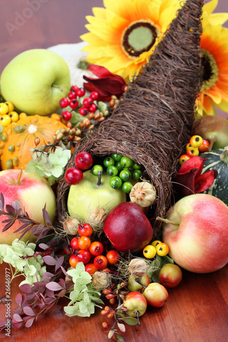 Photo: Autumn cornucopia - symbol of food and abundance Autumn cornucopia - symbol of food and abundance