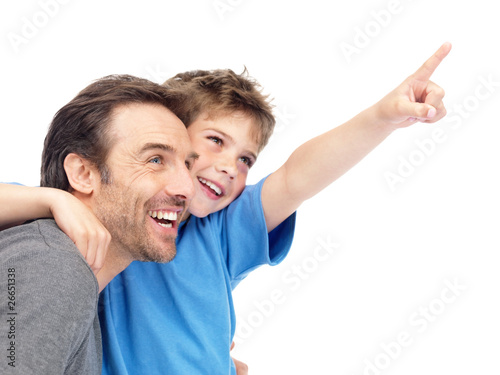Photo: Young boy showing some thing intersting to his father Young boy showing some thing intersting to his father