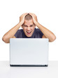 Failure - Disappointed young man looking at laptop Failure - Disappointed young man looking at laptop