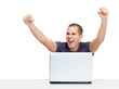 Excited young guy fists raised in air Excited young guy fists raised in air
