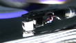 Close up of a record turning on a dj's turntable during party