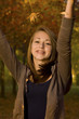 Teen Girl  -  Tossing Fall Leaves
