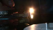 Close up of a disc turning on dj's mixer during an party