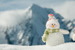 Happy snowman in mountain