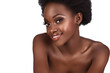 Beautiful African woman with natural make-up laughing