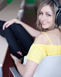 Beautiful young woman listening to music Beautiful young woman listening to music
