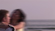 Video: Positive caucasian couple having fun on the beach Positive caucasian couple having fun on the beach
