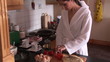 Young couple preparing lunch in bathrobe at home