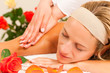 Woman enjoying wellness back massage