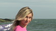 Video: Side view of a captivating woman on the beach Side view of a captivating woman on the beach