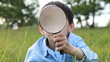 The boy with a magnifier The boy with a magnifier