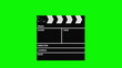 Movie production clapperboard isolated on green background Movie production clapperboard isolated on green background