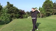 Video: Young man using practicing golf on the green Young man using practicing golf on the green