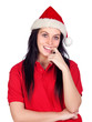 Sexy girl with Christmas hat biting her finger