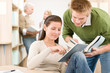 Touch screen tablet computer - students in library Touch screen tablet computer - students in library