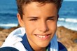handsome teenager boy closeup portrait smiling beach handsome teenager boy closeup portrait smiling beach