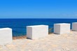 Mediterranean sea coastal view white milestones