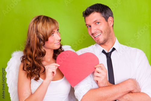 Foto: christmas angel giving gift present to man christmas angel giving gift present to man