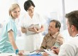 Medical team measuring blood pressure
