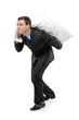 Full length portrait of a businessman carrying a money bag