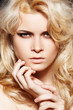 Fashion woman with chic make-up & long blond hair
