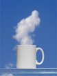 Coffee cup against the sky