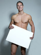 lachender nackter Mann mit Schild