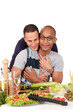 Mixed ethnicity  gay couple kitchen