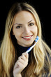 Girl holding a toothbrush