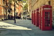 Photo: Street with a Tradicional Red Phone Boxes, London. Street with a Tradicional Red Phone Boxes, London.