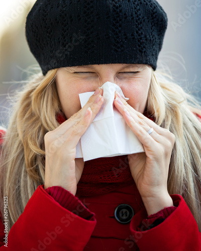 Photo: young woman has a cold young woman has a cold