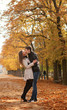 Young beautiful couple in the Luxembourg garden at fall. Paris,