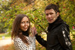 Young beautiful couple at fall