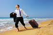 Full length portrait of a lost businessman carrying a suitcase
