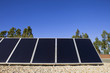 Solar panels on the roof against blue sky