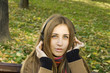 Girl with headphones fall