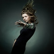 Photo: Fashion portrait of the beautiful woman with flying hair Fashion portrait of the beautiful woman with flying hair