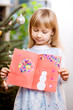 girl with christmas card