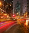 Fast moving cars at night
