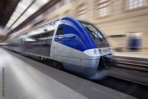 Photo: High-speed train in motion High-speed train in motion